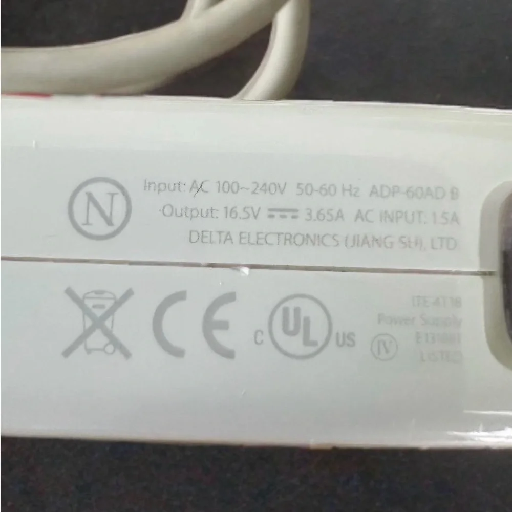 Apple MacBook White Charging Adapter.
